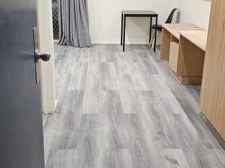 Completed flooring through room and hallway