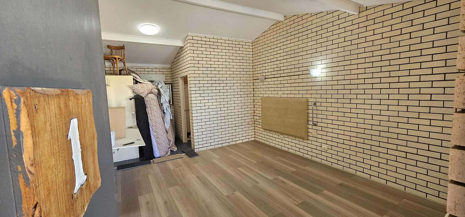 Room after new plank flooring was installed